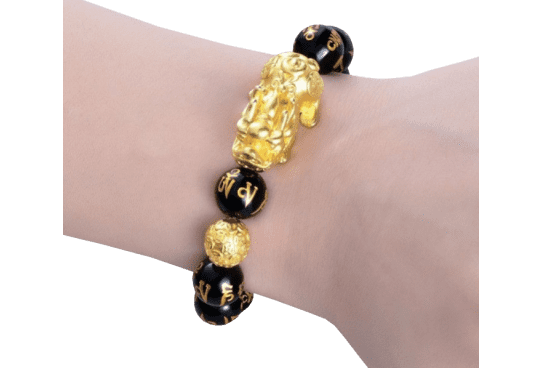 Black Obsidian Bracelet La traduction en espagnol de "Black Obsidian Bracelet" est "Pulsera de Obsidiana Negra".